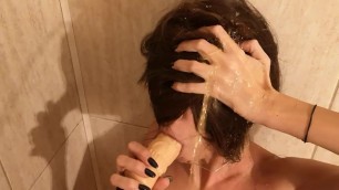 Peeing all over her Face while she's Sucking a Dildo