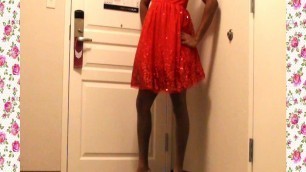 A 1950's SISSY DANCE FOR HER HUSBAND WEARING A PARTY DRESS